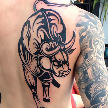 Tribal Bull on Back Tattoo