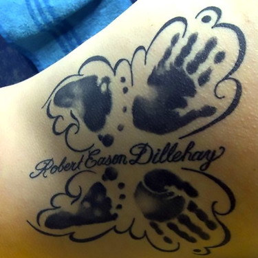 Black Butterfly with baby hand/footprints Tattoo