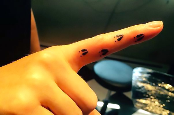 Deer Track on Finger Tattoo Idea