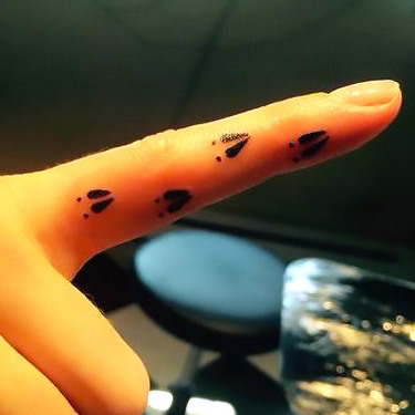 Deer Track on Finger Tattoo