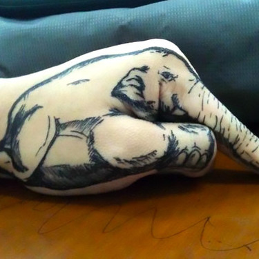 Elephant on Hand Tattoo