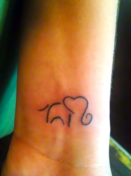Elephant on Wrist Tattoo Idea