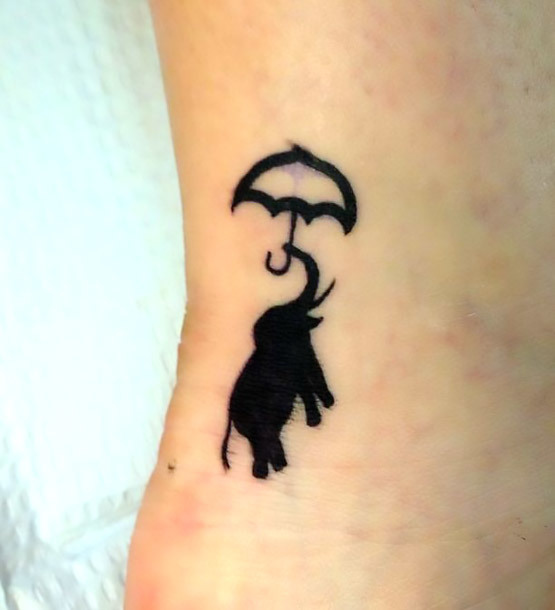 Small Elephant With Umbrella Tattoo Idea