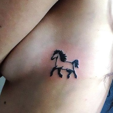 Small Horse on Side Tattoo