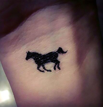 Small Horse Silhouette Tattoo Idea