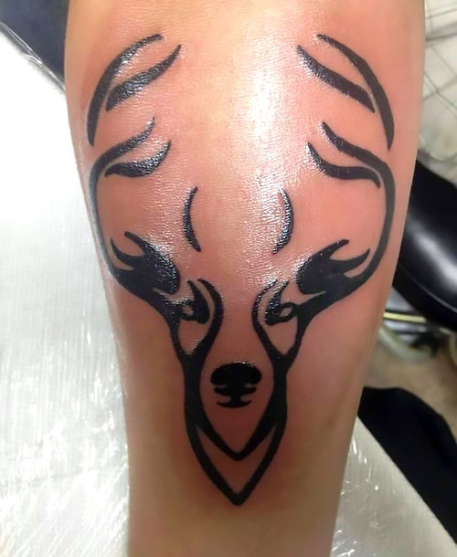 Tribal Deer Head Tattoo Idea
