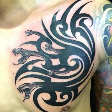 Awesome Tribal Snakes Tattoo