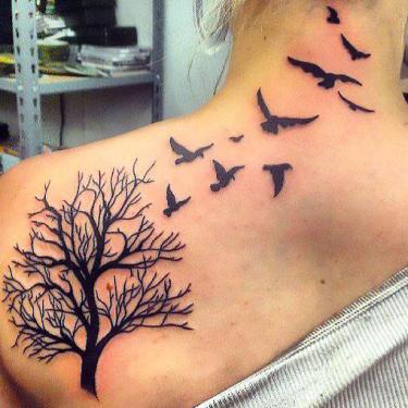 Birds Flying Away Tattoo