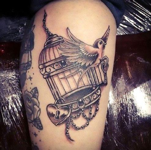 Locked Bird Is Free Tattoo Idea