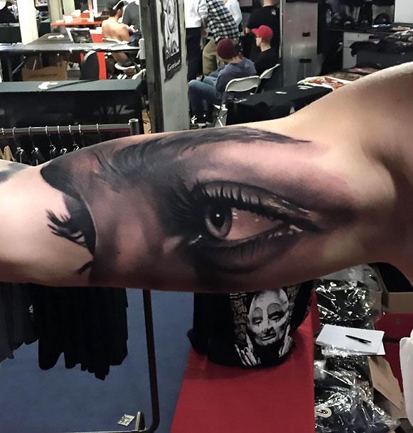 Black and Gray Eyes on Bicep Tattoo Idea